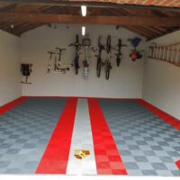Porsche themed garage with floor tiles