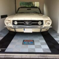 vintage mustang in a garage with swisstrax flooring