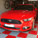 grey and red checkered pattern in a garage with diamond home floor tiles