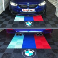 BMW and logo in garage flooring