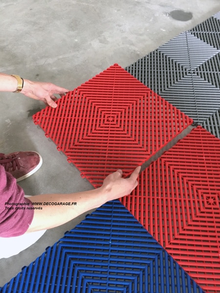 snap-on floor tiles installation demonstration with swisstrax floor tiles