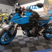 Moto display podium using clip-on tiles