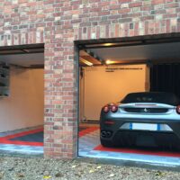 garage double avec des dalles de sol SWISSTRAX