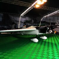 Small plane on green removable tiles