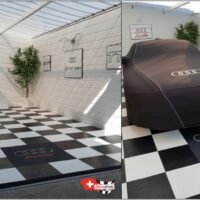 réalisation d'un garage moderne Audi avec un damier en dalles de sol pleine SWISSTRAX