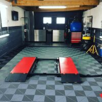 car workshop with floor tiles